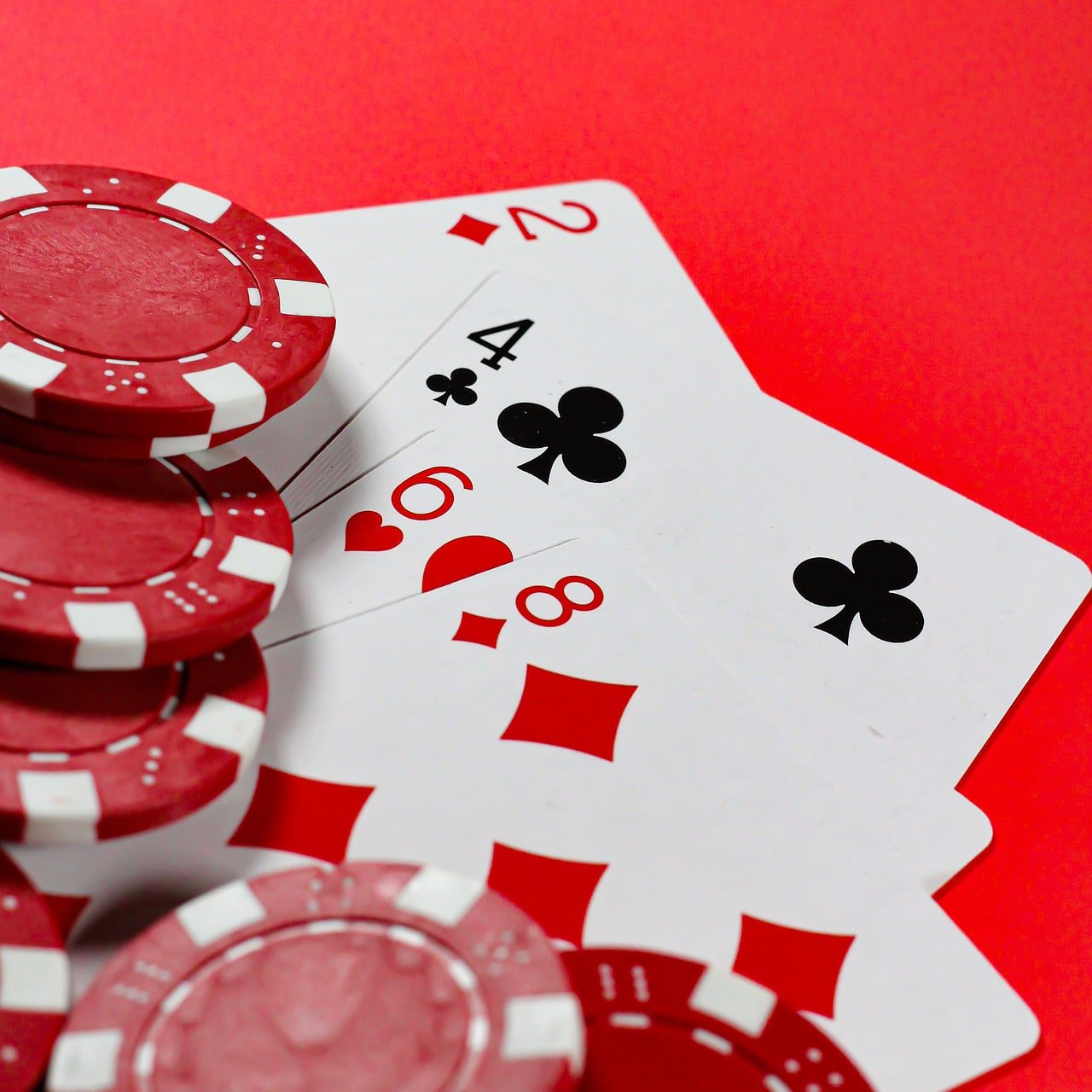 Blueprint Gaming live blackjack table with professional dealer and multi-camera display on qqjoker platform