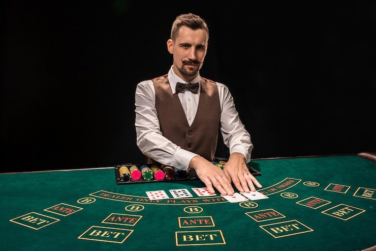 Pretty Gaming baccarat and blackjack tables side by side in live-dealer studio